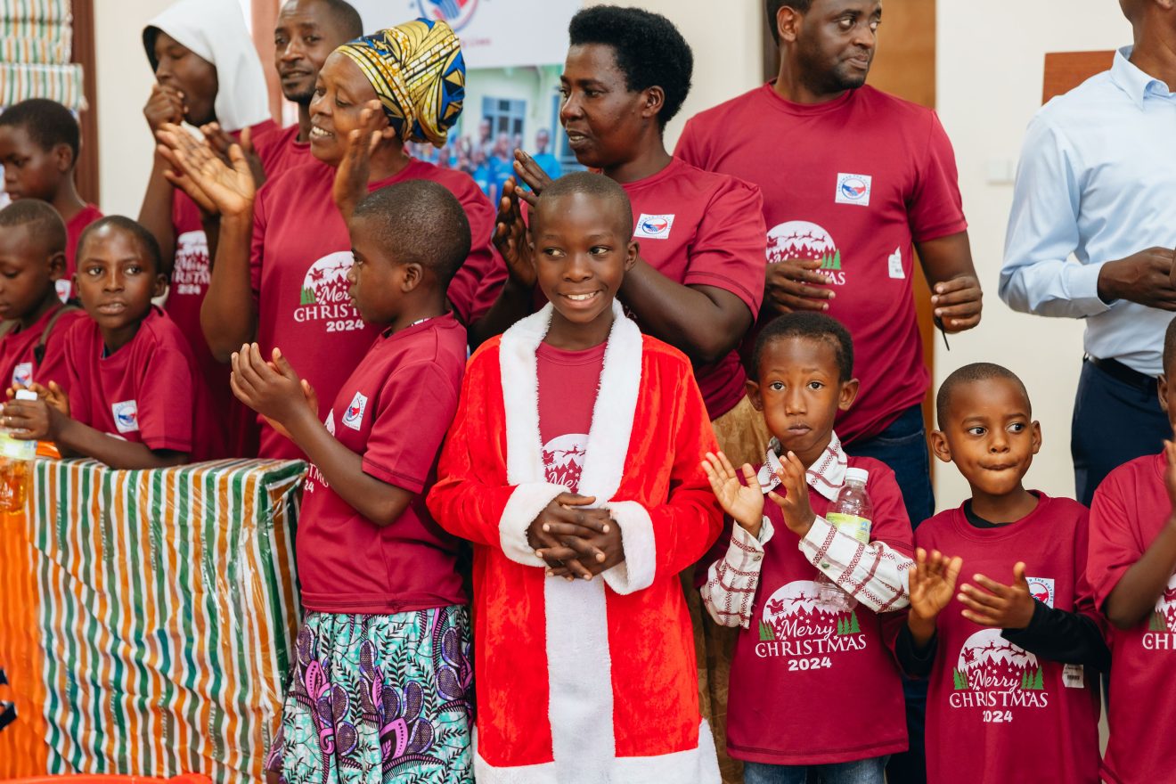 Community members and children together